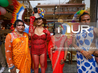 Members of the sexual minority LGBTIQ+ group of Nepal are posing for a photo during the Gaijatra (Pride) parade in Kathmandu, Nepal, on Augu...