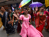 Members of the sexual minority LGBTIQ+ group of Nepal are dancing during the Gaijatra (Pride) parade in Kathmandu, Nepal, on August 20, 2023...