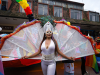 A member of the sexual minority LGBTIQ+ group of Nepal is posing for a photo during the Gaijatra (Pride) parade in Kathmandu, Nepal, on Augu...