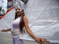 A member of the sexual minority LGBTIQ+ group of Nepal is posing for a photo during the Gaijatra (Pride) parade in Kathmandu, Nepal, on Augu...