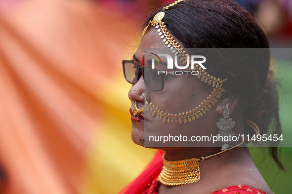 A member of the sexual minority LGBTIQ+ group of Nepal is participating in the Gaijatra (Pride) parade in Kathmandu, Nepal, on August 20, 20...