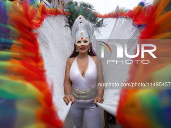 A member of the sexual minority LGBTIQ+ group of Nepal is gesturing during the Gaijatra (Pride) parade in Kathmandu, Nepal, on August 20, 20...