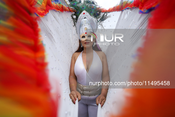 A member of the sexual minority LGBTIQ+ group of Nepal is gesturing during the Gaijatra (Pride) parade in Kathmandu, Nepal, on August 20, 20...