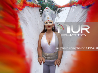 A member of the sexual minority LGBTIQ+ group of Nepal is gesturing during the Gaijatra (Pride) parade in Kathmandu, Nepal, on August 20, 20...