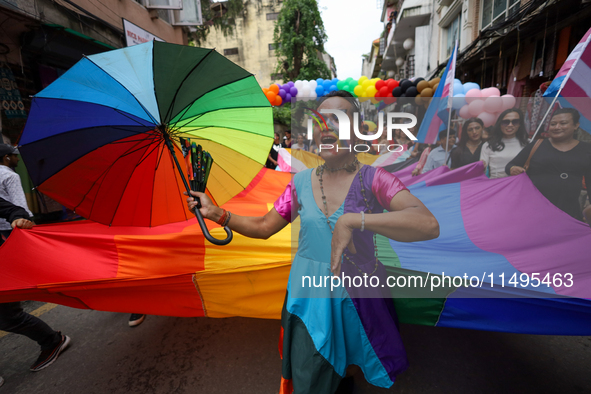 A member of the sexual minority LGBTIQ+ group of Nepal is dancing during the Gaijatra (Pride) parade in Kathmandu, Nepal, on August 20, 2023...