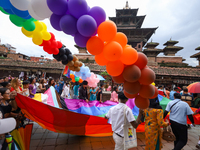 Members of the sexual minority LGBTIQ+ group of Nepal are walking past the Taleju Bhawani Temple located in Kathmandu Durbar Square, a UNESC...