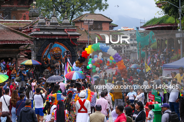 Members of the sexual minority LGBTIQ+ group of Nepal are walking past the Kaal Bhairab statue located in Kathmandu Durbar Square, a UNESCO...