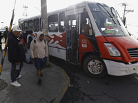 Transporters are circulating on flooded streets in the Colonia Culturas de Mexico in Chalco, State of Mexico, on August 20, 2024, where seve...