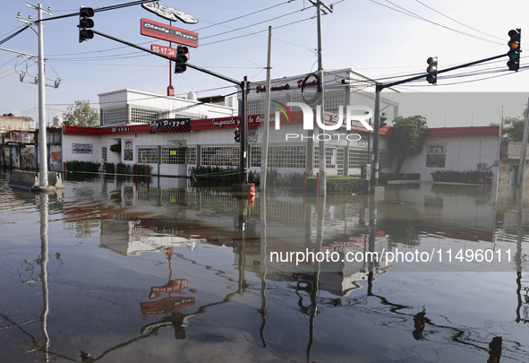 View of flooded streets in the Colonia Culturas de Mexico in Chalco, State of Mexico, where several families are being severely affected by...