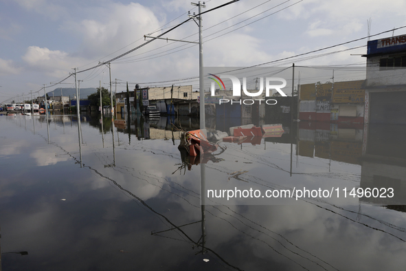 View of flooded streets in the Colonia Culturas de Mexico in Chalco, State of Mexico, where several families are being severely affected by...