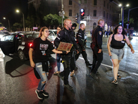 Israeli police officers are moving demonstrators blocking a street during a protest in Jerusalem, Israel, on August 20, 2024. People are gat...