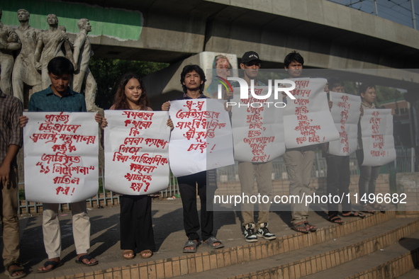 Tribal students of Dhaka University are holding a rally in Dhaka, Bangladesh, on August 20, 2024, demanding the withdrawal of military rule...