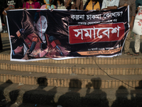 Tribal students of Dhaka University are holding a rally with a banner displaying a portrait of Kalpana Chakma in Dhaka, Bangladesh, on Augus...