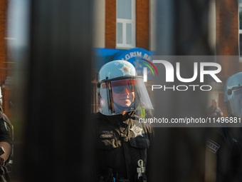 Riot police during the pro-Palestine protest on the first day of the Democratic National Convention on August 19, 2024. The protesters march...