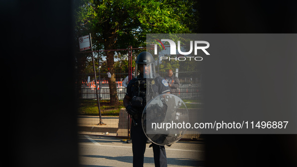 Riot police during the pro-Palestine protest on the first day of the Democratic National Convention on August 19, 2024. The protesters march...