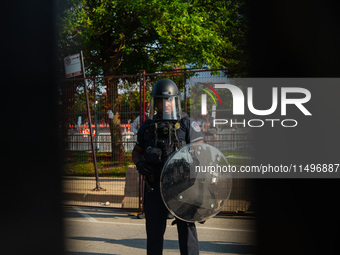 Riot police during the pro-Palestine protest on the first day of the Democratic National Convention on August 19, 2024. The protesters march...