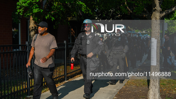 Riot police during the pro-Palestine protest on the first day of the Democratic National Convention on August 19, 2024. The protesters march...