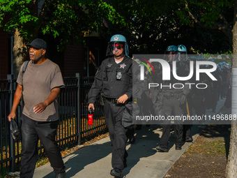 Riot police during the pro-Palestine protest on the first day of the Democratic National Convention on August 19, 2024. The protesters march...