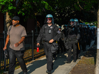 Riot police during the pro-Palestine protest on the first day of the Democratic National Convention on August 19, 2024. The protesters march...