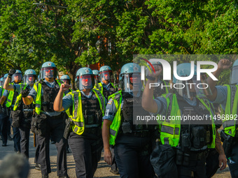 Riot police during the pro-Palestine protest on the first day of the Democratic National Convention on August 19, 2024. The protesters march...