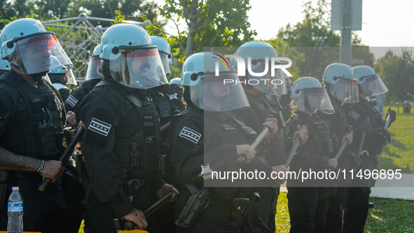 Riot police during the pro-Palestine protest on the first day of the Democratic National Convention on August 19, 2024. The protesters march...