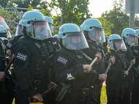 Riot police during the pro-Palestine protest on the first day of the Democratic National Convention on August 19, 2024. The protesters march...