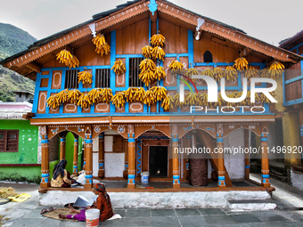 Corn is hanging outside a home in the Sainji Village (Corn Village) in Mussoorie, Uttarakhand, India, on April 18, 2024. This village is fam...