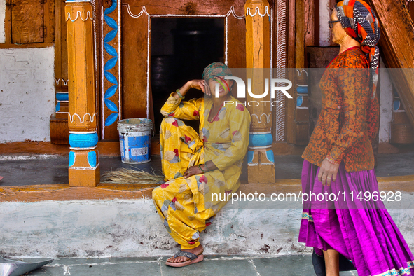 Village women are chatting in the Sainji Village (Corn Village) in Mussoorie, Uttarakhand, India, on April 18, 2024. This village is famous...