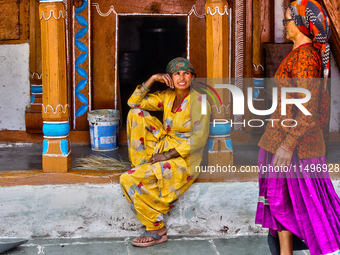 Village women are chatting in the Sainji Village (Corn Village) in Mussoorie, Uttarakhand, India, on April 18, 2024. This village is famous...