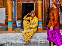 Village women are chatting in the Sainji Village (Corn Village) in Mussoorie, Uttarakhand, India, on April 18, 2024. This village is famous...