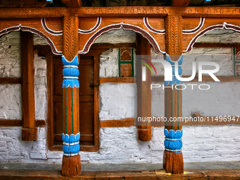 A traditional home in Sainji Village (Corn Village) in Mussoorie, Uttarakhand, India, is displaying bunches of corn cobs outside on April 18...