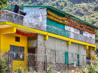 Corn is hanging outside a home in the Sainji Village (Corn Village) in Mussoorie, Uttarakhand, India, on April 18, 2024. This village is fam...