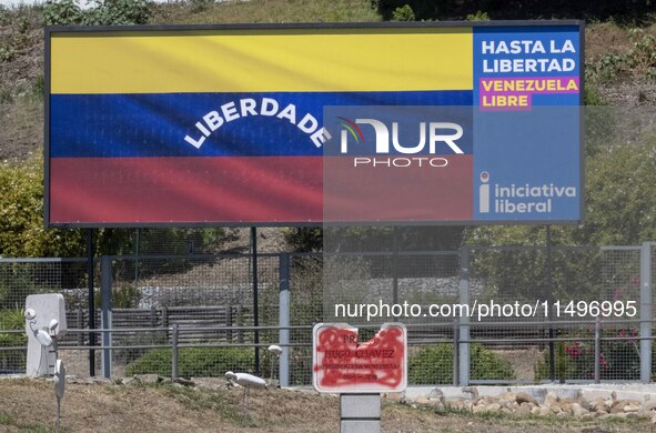 An image of a billboard with the inscription in Spanish ''Venezuela Libre'' (free Venezuela) is located in the center of Lisbon, Portugal, o...