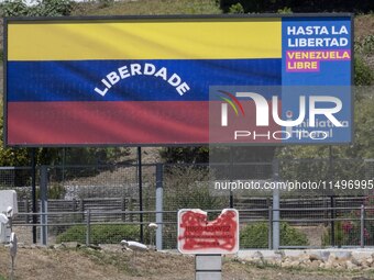 An image of a billboard with the inscription in Spanish ''Venezuela Libre'' (free Venezuela) is located in the center of Lisbon, Portugal, o...