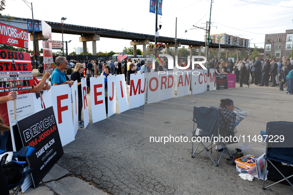 Progressive demonstrators gather at an entrance to the Democratic National Convention in Chicago, Illinois on August 20, 2024. 