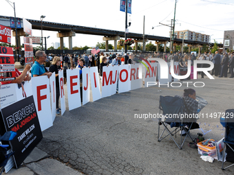 Progressive demonstrators gather at an entrance to the Democratic National Convention in Chicago, Illinois on August 20, 2024. (