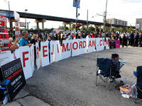 Progressive demonstrators gather at an entrance to the Democratic National Convention in Chicago, Illinois on August 20, 2024. (