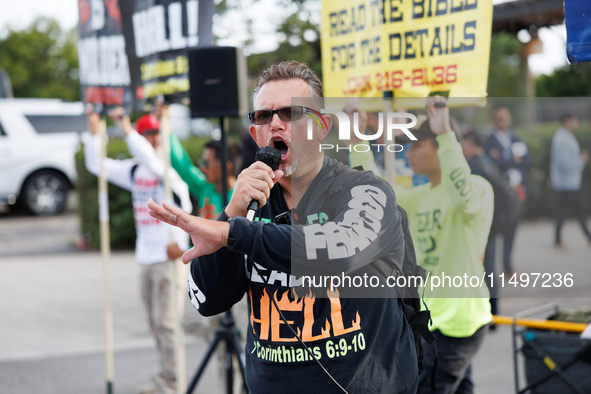 Anti-abortion rights demonstrators gather at an entrance to the Democratic National Convention in Chicago, Illinois on August 20, 2024. 