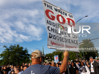 An anti-abortion rights demonstrator protests at an entrance to the Democratic National Convention in Chicago, Illinois on August 20, 2024....