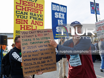 Opposing abortion rights demonstrators protest at an entrance to the Democratic National Convention in Chicago, Illinois on August 20, 2024....