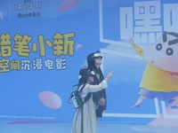 Visitors are watching the world's first VR movie ''Me and Crayon Shin-chan'' through multimedia smart VR glasses in Hangzhou, China, on Augu...