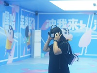 Visitors are watching the world's first VR movie ''Me and Crayon Shin-chan'' through multimedia smart VR glasses in Hangzhou, China, on Augu...