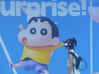 Visitors are watching the world's first VR movie ''Me and Crayon Shin-chan'' through multimedia smart VR glasses in Hangzhou, China, on Augu...