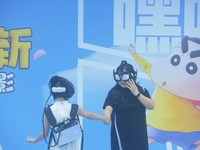 Visitors are watching the world's first VR movie ''Me and Crayon Shin-chan'' through multimedia smart VR glasses in Hangzhou, China, on Augu...