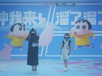 Visitors are watching the world's first VR movie ''Me and Crayon Shin-chan'' through multimedia smart VR glasses in Hangzhou, China, on Augu...