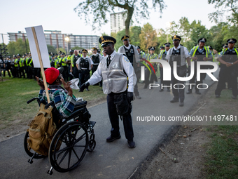 Thousands are marching outside the DNC in Chicago, Illinois, on August 19, 2024, to protest the war on Gaza. At the end of the march, a grou...