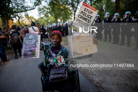 Thousands are marching outside the DNC in Chicago, Illinois, on August 19, 2024, to protest the war on Gaza. At the end of the march, a grou...