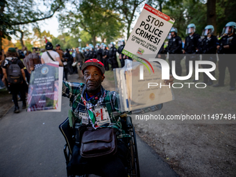 Thousands are marching outside the DNC in Chicago, Illinois, on August 19, 2024, to protest the war on Gaza. At the end of the march, a grou...