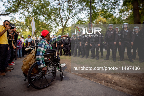 Thousands are marching outside the DNC in Chicago, Illinois, on August 19, 2024, to protest the war on Gaza. At the end of the march, a grou...