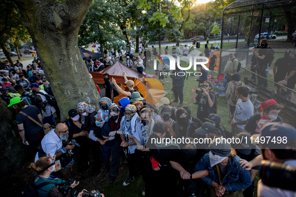 Thousands are marching outside the DNC in Chicago, Illinois, on August 19, 2024, to protest the war on Gaza. At the end of the march, a grou...